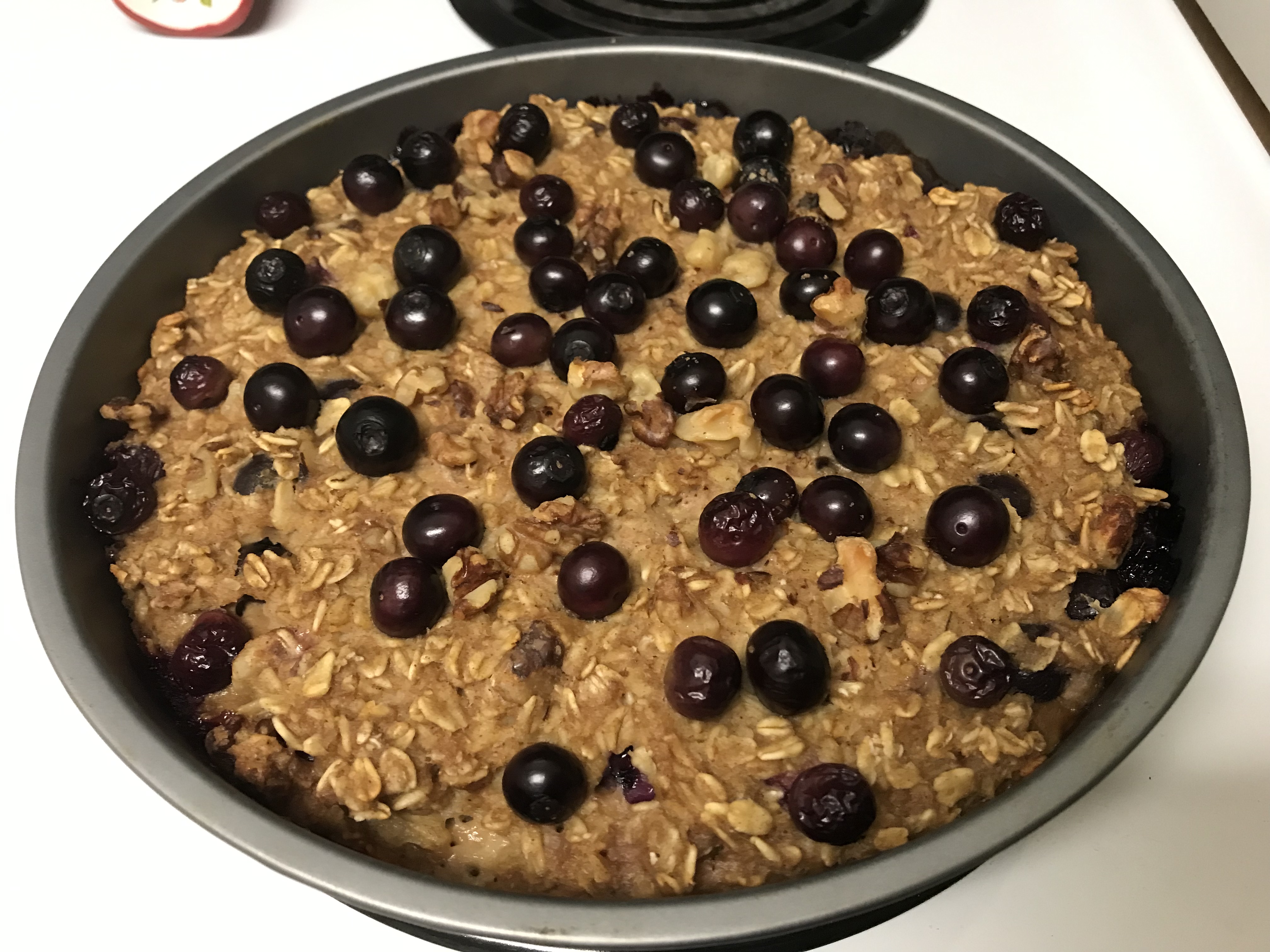 photo of final blueberry baked oatmeal with blueberries on top
